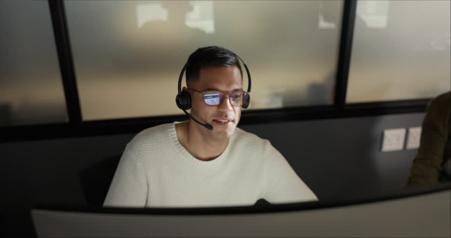 Call center, training and man coaching black woman coworker at customer service agency. Diversity, teamwork and crm, telemarketing manager consulting with agent at desk for customer support help line | Shutterstock HD Video #1099827029