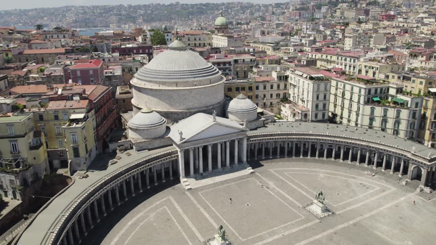 Aerial orbiting view of the Famous square Piazza del Plebiscito with San Francesco di Paola Church, Naples. Italy