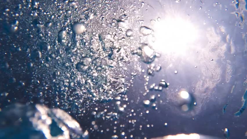 Underwater slow motion video of deep blue air bubbles released in jacuzzi spa creating perfect relaxing treatment for well being Royalty-Free Stock Footage #1099830903