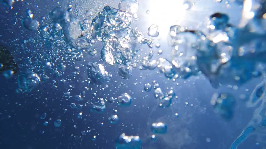 Underwater slow motion video of deep blue air bubbles released in jacuzzi spa creating perfect relaxing treatment for well being Royalty-Free Stock Footage #1099830907