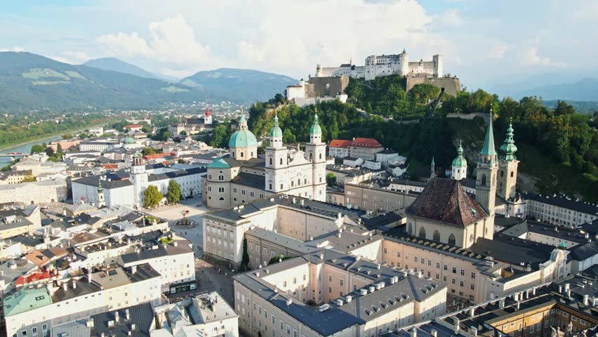 aerial drone panorama of Salzburg city in Austria. View of the historic city of Salzburg and Salzach river at summer