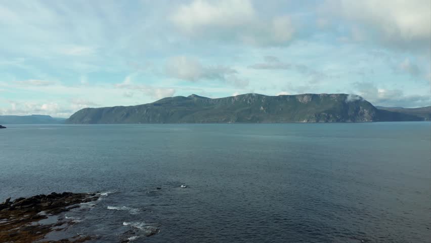 Gros Morne National Park - Drone Clip revealing the shoreline with ocean and mountains in the foreground