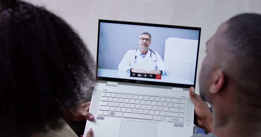 Pregnant Couple In Online Video Conference Call With Doctor | Shutterstock HD Video #1099847039