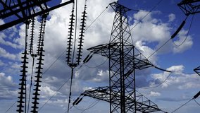 Electricity pylon (high voltage power line) on the background of the cloudy sky (time lapse)   - Powered by Shutterstock - Get 15% off with code: PIKWIZARD15