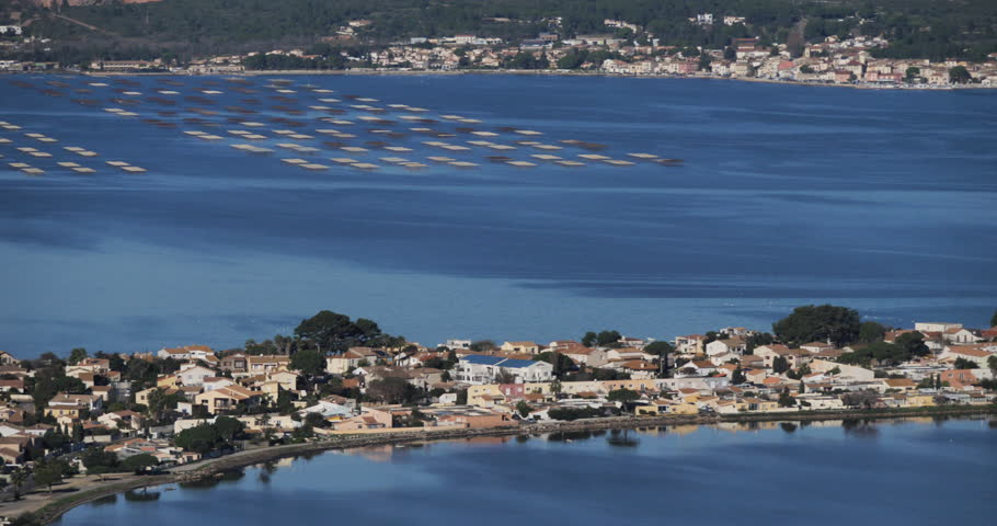 Sète, Hérault department,Occitanie, France. The etang de Thau. In the background is the oyster farming of Bouzigues. 