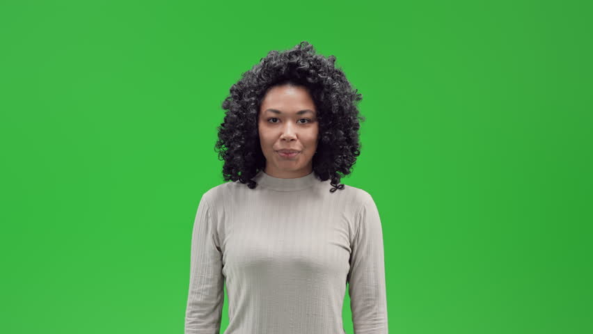 African american woman hide by covering face with hand play hide and seek Isolated on Green Screen | Shutterstock HD Video #1099859347