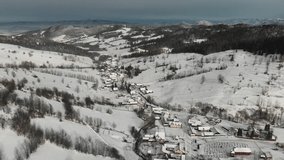 Winter village in the valley - Drone Video - D-Cinelike
