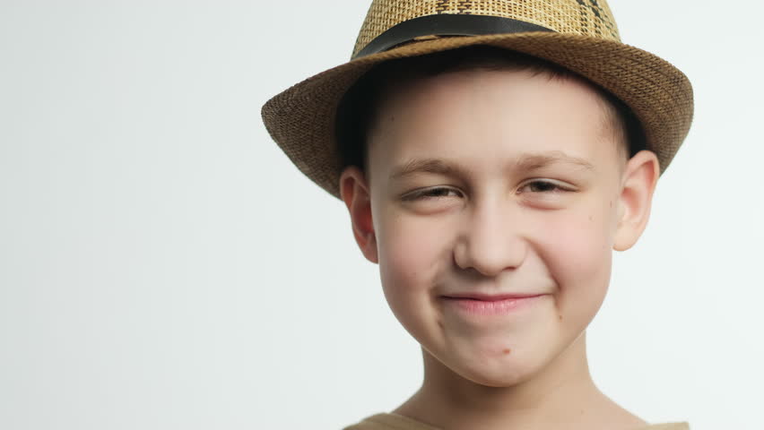 Kid celebrating Valentines day. Video portrait of boy wearing funny heart shaped eyeglasses.  | Shutterstock HD Video #1099866795
