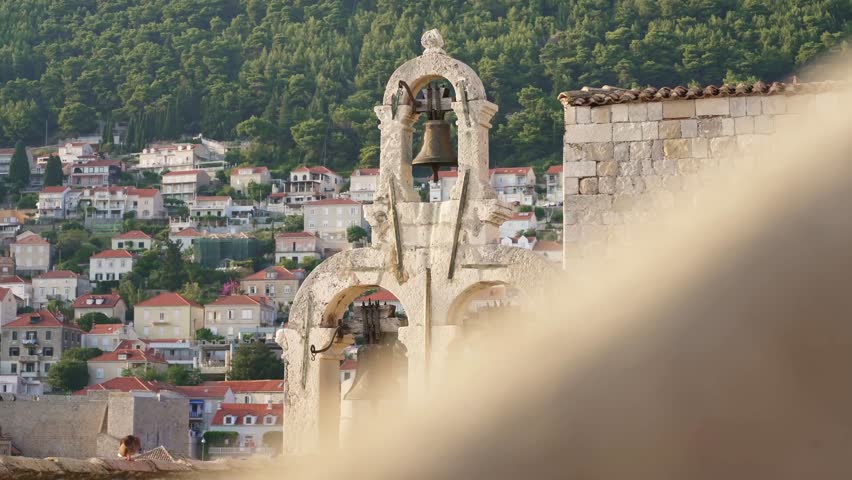 Dubrovnik Old Town, Croatia tower bell. Famous fortress. Travel destination for tourist visiting Croatia. Europe summer tourism.  Royalty-Free Stock Footage #1099866985