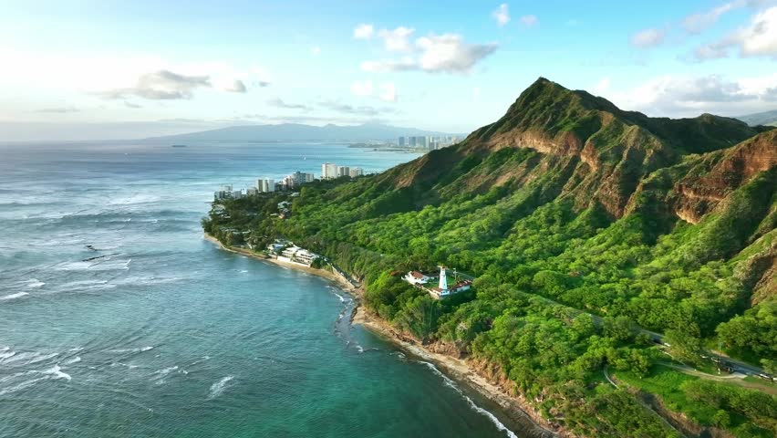 Drone Honolulu, Hawaii. Aerial view Diamond head Lighthouse on sea cliffs. tourist landmark in Waikiki. 