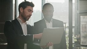 Caucasian professional male business expert man advice software pointing on laptop consulting African American client customer investor about online trading digital investment explain data at office - Powered by Shutterstock - Get 15% off with code: PIKWIZARD15