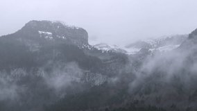 Wide angle  4K video 60 fps beauty of the Spanish Pyrenees in winter with a majestic 4K 60 fps  of a snow-covered mountain landscape. Concept: nature lover