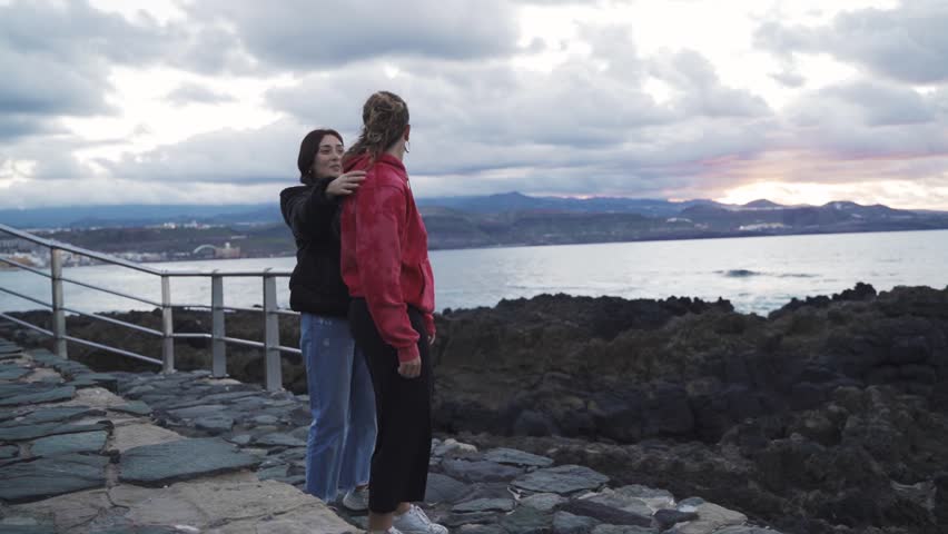 lgbt couple of two caucasian women in love and playing at riding each other