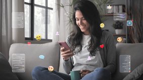Young woman on couch uses smartphone,graphic representation of social media emoticons ,posts,likes,smiley faces flying around device,3d icons animation visualization - Powered by Shutterstock - Get 15% off with code: PIKWIZARD15