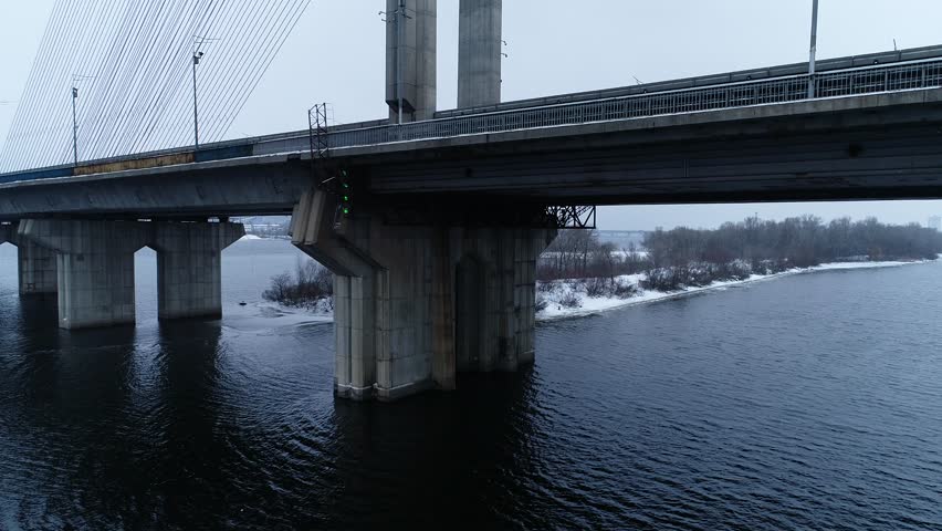 South bridge. Peak hour. Aerial. Kyiv. Ukraine. Winter. Bridge over the Dnieper river. 
Frosty morning