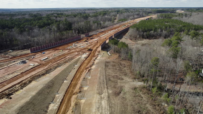 Drone shot of large highway construction, 540 Beltline North Carolina