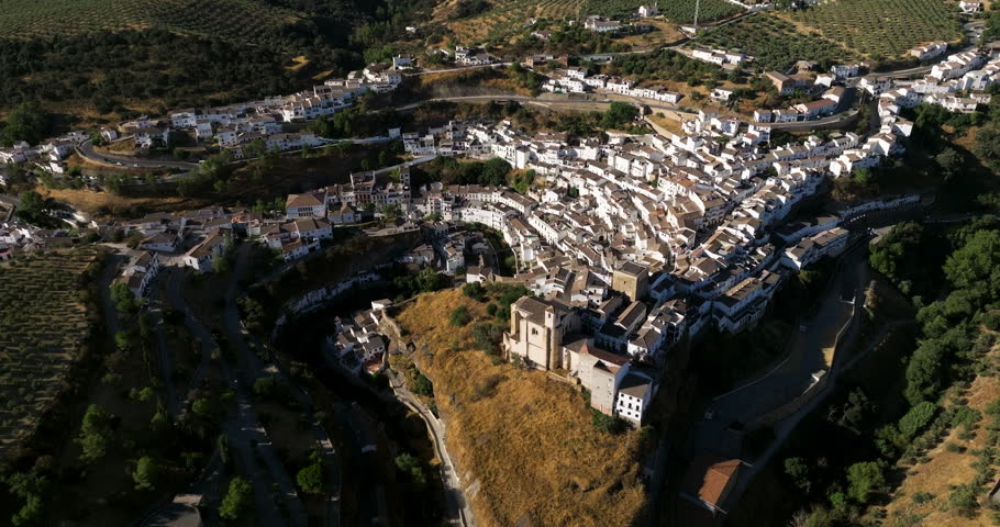 Setenil de las Bodegas With Whitewashed Houses In Andalusia Region, Spain - aerial panoramic Royalty-Free Stock Footage #1099884939