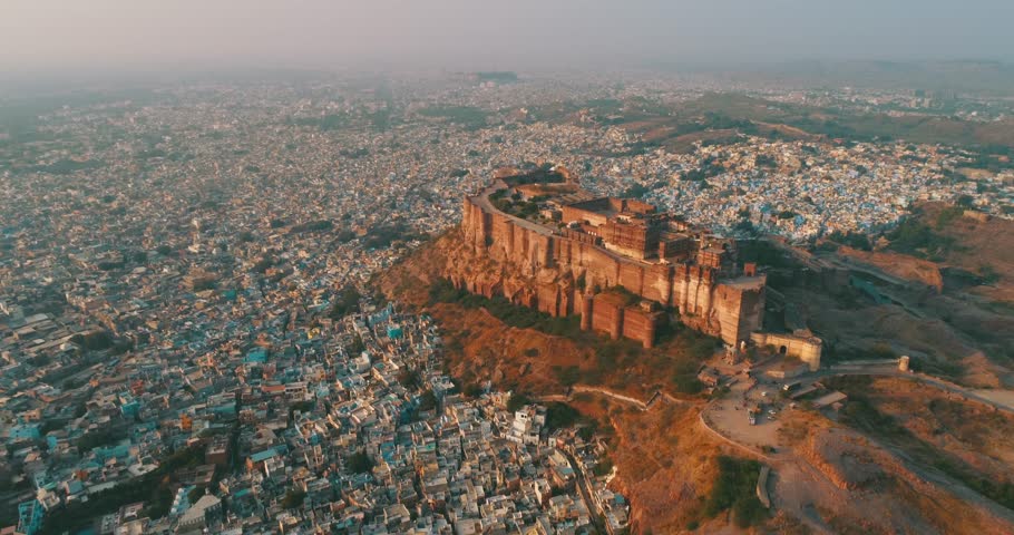 An Aerial view video by drone of Mehrangarh Fort,Museum and Blue City village In Jodhpur, Rajasthan, India 
