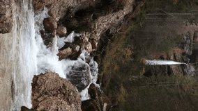 Big Pericnik Waterfall in Vrata Valley Slovenia in Autumn Time Vertical 4K Video