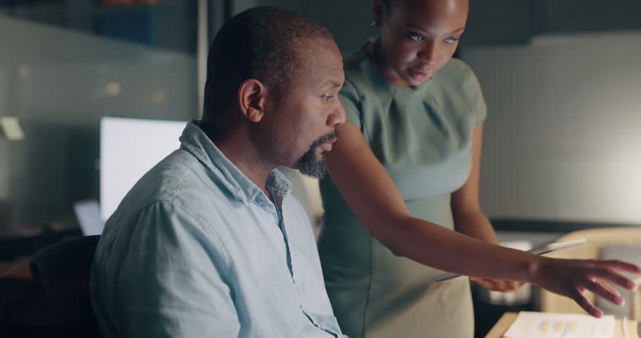 Support, tablet and business people with african innovation, digital marketing strategy and communication for global networking advice. Black woman help employee at night desk on technology software Royalty-Free Stock Footage #1099896355