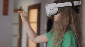 Modern Education Child in Virtual Reality Glasses, Learning in Virtual Reality, Girl Immersed in Cyberspace. Child Playing Games On Virtual Reality Device. Girl Learning Using Virtual Reality Headset - Powered by Shutterstock - Get 15% off with code: PIKWIZARD15