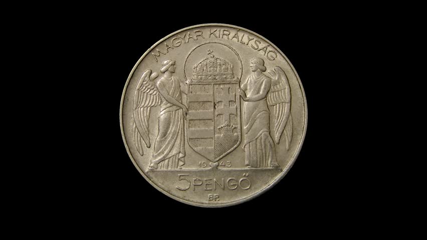 Obverse of Hungary commemorative coin 5 pengo 1943 with inscription meaning HUNGARIAN KINGDOM, isolated in black background. Close up view.