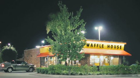 TAMPA, FL - JULY 30, 2015: Waffle House restaurant open for late night business on July 30, 2015. Waffle House, Inc., is a restaurant chain with more than 2,100 locations in 25 states in the United States.
