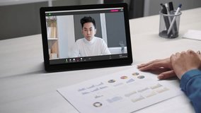 Online business analytics. Video meeting. DIstance conference. Colleagues discussing statistics working with charts graphs using tablet at virtual office. - Powered by Shutterstock - Get 15% off with code: PIKWIZARD15