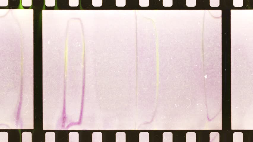 35mm film strip material with developing smear marks and empty frames sliding in. cool video film border transition or overlay in 4k with luma mask.
