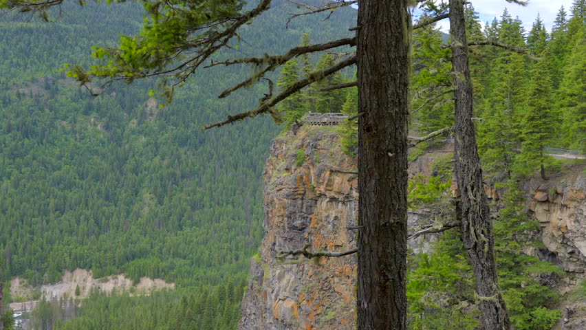 Establishing shot of majestic mountain river with mountain background in Vancouver, Canada, North America. Day time on April 2022. Still camera view. ProRes 422 HQ.