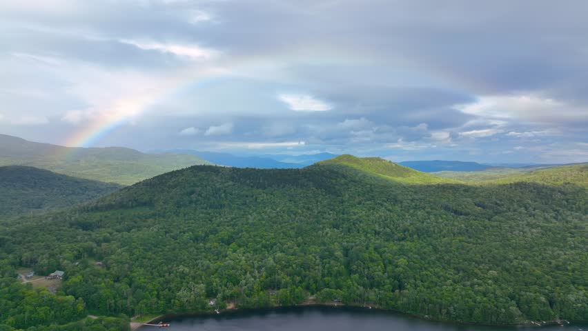 Stinson Mountain, Tenney Mountain and Baker River valley between them from top of Rumney historic center aerial view in summer in White Mountain National forest, Rumney, New Hampshire NH, USA. 