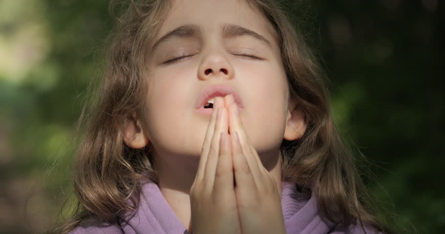 Religion. Child Girl Folded Lifestyle Her Hands in Prayer Pray to God on Outdoor. Worried Teenager Girl Looking for Hope and Faith Praying to God. Religious Child With Hope in His Heart Prays to God.