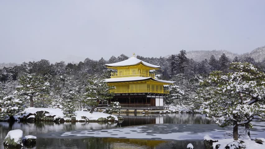 Snowy Kinkaku-ji Temple in winter. Famous tourist attraction in Kyoto, Japan. The Golden Pavilion, Kinkakuji, rokuon-ji, rokuon-ji. Snow landscape.