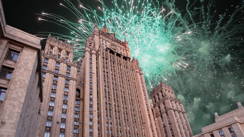 Celebratory colorful fireworks and  Ministry of Foreign Affairs of the Russian Federation, Moscow, Russia  (time lapse) 