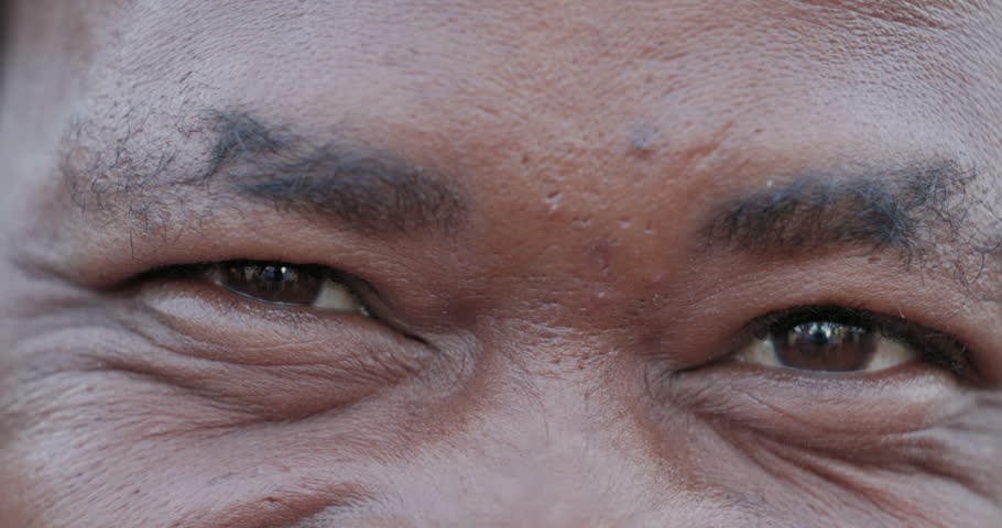 Close-up cropped collage of smiling Black African people's eyes | Shutterstock HD Video #1099949255