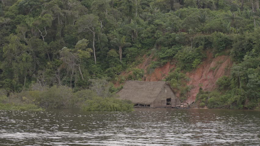Point Of View Of Hut By Green Trees On Rock Formation Seen From Sea - Manaus, Brazil