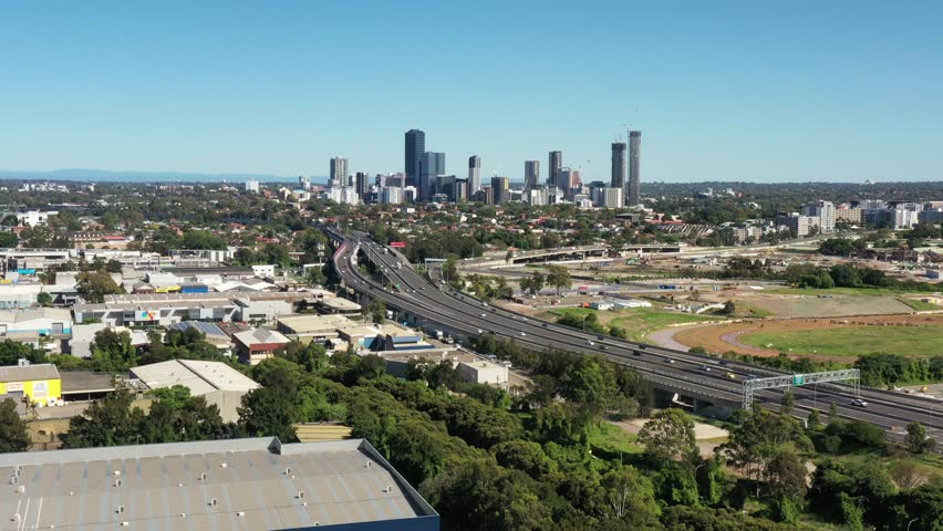 M4 toll road motorway to Parramatta city in Western Sydney – aerial 4k.
 | Shutterstock HD Video #1099967005