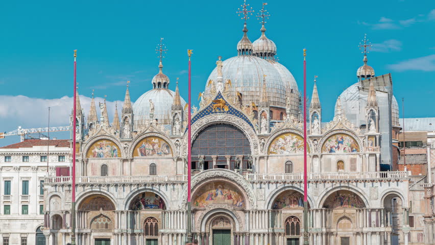 Front view of Basilica of St Mark timelapse. It is cathedral church of Roman Catholic Archdiocese of Venice. It lies at Piazza San Marco. Tourists walking in front of it. Venice, Italy