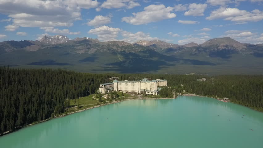 Aerial: Chateau Lake Louise hotel in Banff National Park, Rocky Mtns