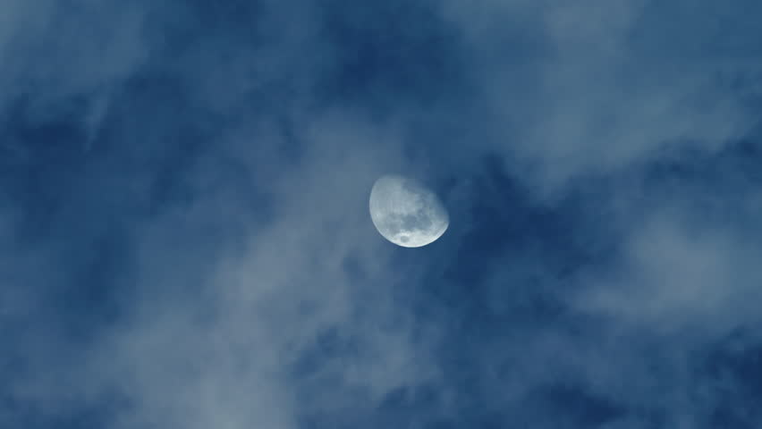 Moon in late evening with clouds in the sky, a Nature Video by Polonio Video