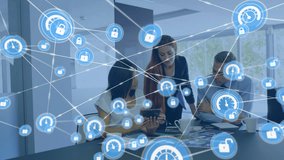 Animation of icons connected with lines over multiracial coworkers discussing reports in office. Digital composite, multiple exposure, business, communication, teamwork and technology concept. - Powered by Shutterstock - Get 15% off with code: PIKWIZARD15