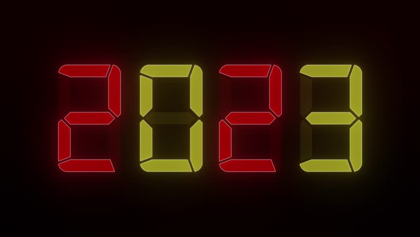 Video animation of an LED display in red and yellow with the continuous years 2000 to 2023 over dark background - represents the new year 2023 - holiday concept | Shutterstock HD Video #1099990963