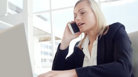 Animation of data processing with networks and icons over caucasian businesswoman using smartphone. Global business, finances, computing and data processing concept digitally generated video. - Powered by Shutterstock - Get 15% off with code: PIKWIZARD15