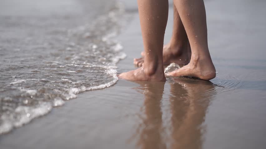 Enjoying in sea foot close up of couple | Shutterstock HD Video #1099995007