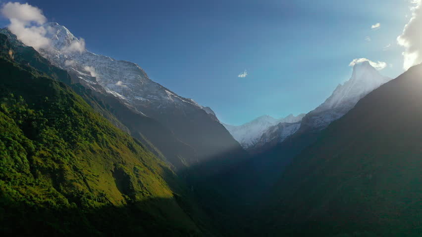 Aerial drone view flying through the magnificent Annapurna Mountain Range in the Himalayas, Nepal