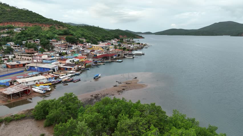 Camera moving over the waterfront of small Venezuelan town Mochima in Mochima National Park, Venezuela.