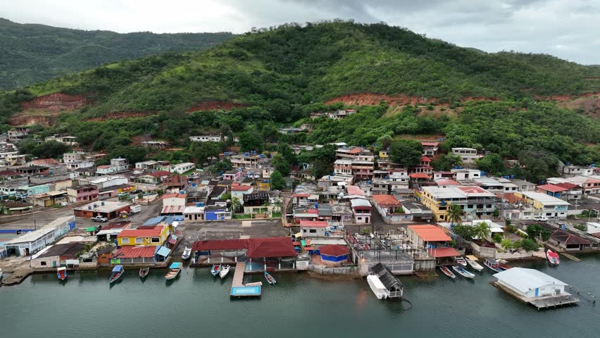 Camera moving away from small Venezuelan town of Mochima in Mochima National Park, Venezuela.
