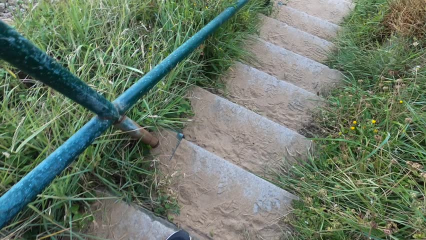 Some stairs leading to a lonely beach