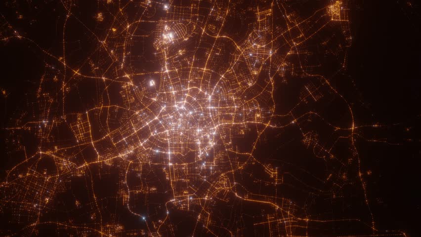 Tianjin (China) top view at night. Aerial view on modern city from space. Camera is flying above the city, moving forward. Vertical video. The north is on the left side