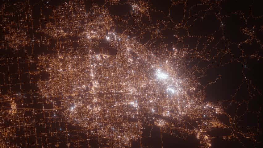 Boise (Idaho, USA) aerial view at night. Top view on modern city with glow effect. Camera is zooming out, rotating counterclockwise